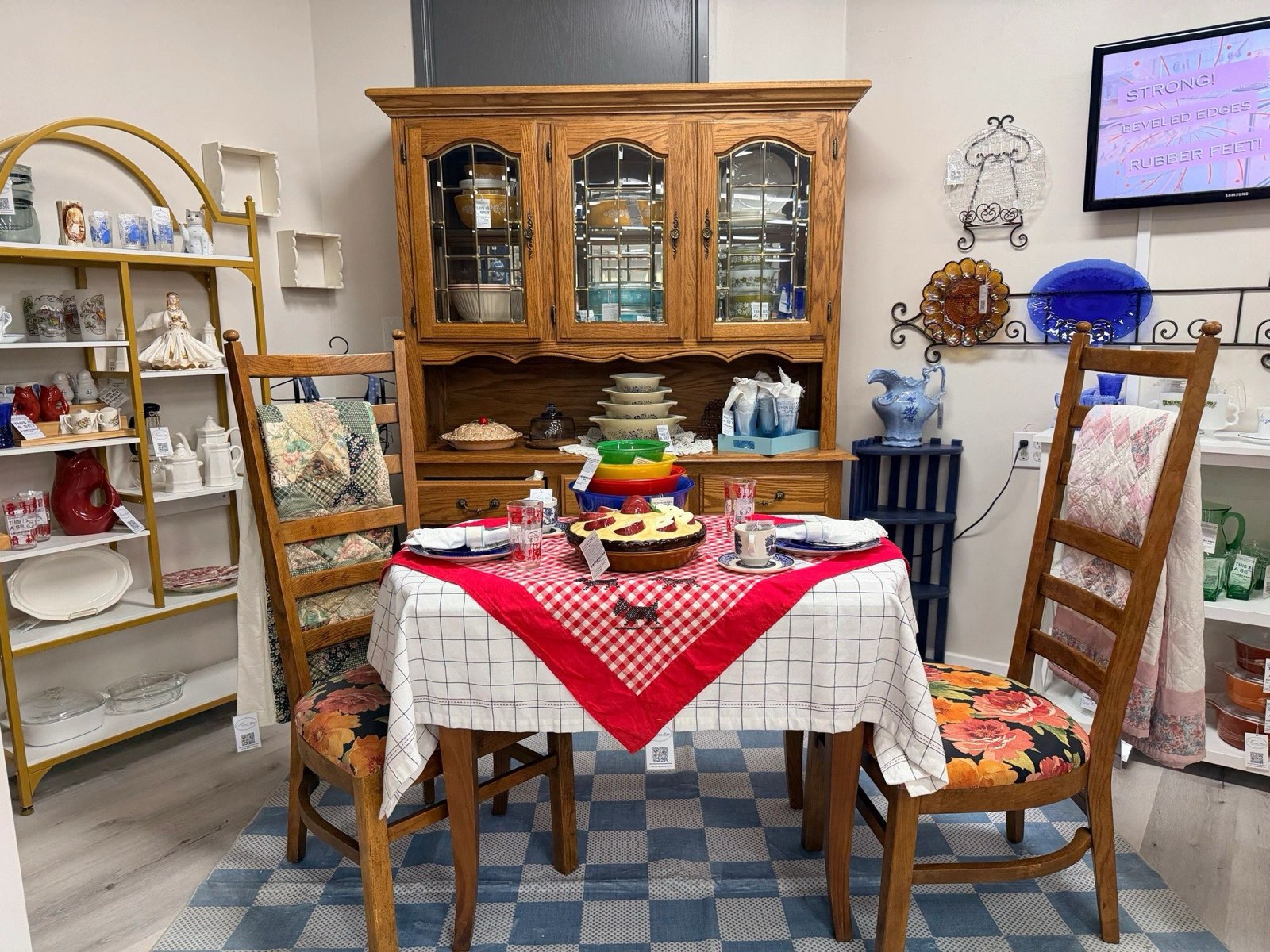 A curated shelf of vintage glassware and kitchenware styled by Marissa's Home